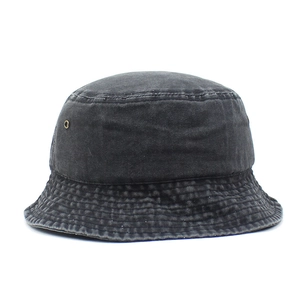 Detailed shot of dark gray washed denim bucket hat showing metal eyelets and stitching