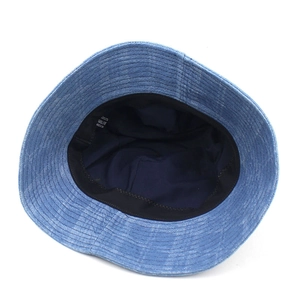Inside view of light blue washed denim bucket hat showing cotton lining and sweatband