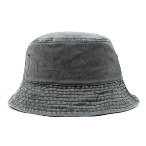 Close-up of charcoal gray washed cotton bucket hat showing metal ventilation eyelets