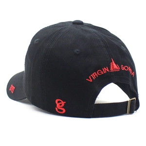 Close-up of red anchor embroidery and adjustable metal buckle on a black cotton baseball cap
