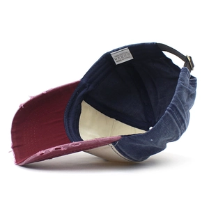 Retro patchwork cotton baseball cap with distressed wine red brim and navy crown