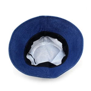 Deep blue denim sun hat featuring a wide brim, interior sweatband and white lining detail
