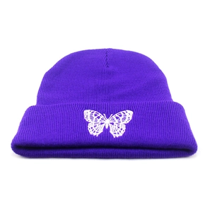 Women's warm knit beanie hat in bright purple with elegant white butterfly embroidery