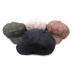 Classic British plaid newsboy caps in dark grey, army green, cream and reddish brown