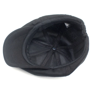 Classic black cotton newsboy cap for men and women featuring adjustable elastic back band