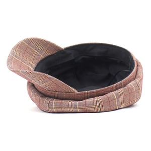 Classic red plaid newsboy cap for women with blue and yellow checkered pattern detail