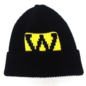 Winter black knit beanie with yellow letter W patch and large colorful fur pompom