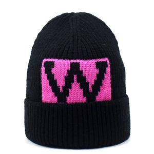 Women's black knitted beanie featuring a pink pixelated W logo for winter style