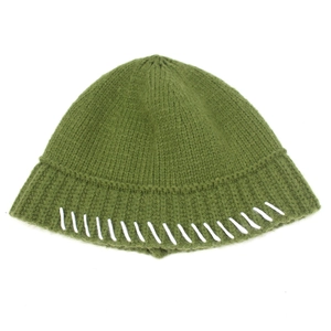 Green knit bucket hat for women with white contrast stitching detail for winter warmth