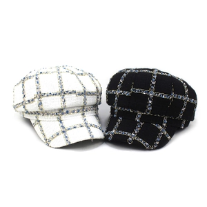 Retro plaid wool newsboy caps for women in black and white tweed with golden thread