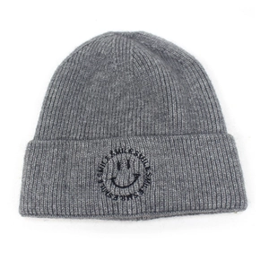 Thick grey knitted beanie hat with smile face embroidery and ribbed texture design