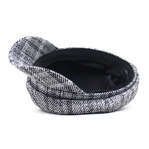 Vintage black and white plaid newsboy cap in tweed fabric for autumn and winter fashion