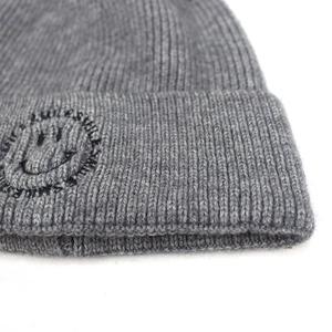 Gray knitted beanie with black smiley embroidery and SMILE text for women and men