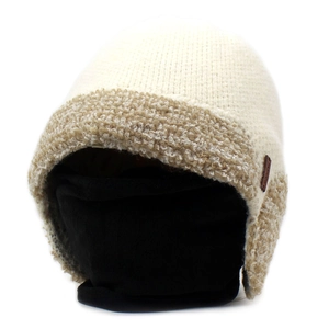 Detail of cream white knit winter hat with fuzzy faux shearling lining and ear flaps