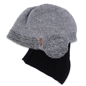 Detailed view of gray knitted winter hat with ear flaps and black fleece neck warmer set