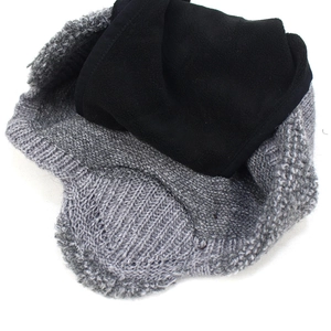 Grey winter knitted hat with warm black fleece lining for outdoor thermal protection