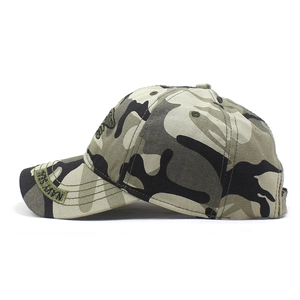 Detail showing NAVY SEAL embroidery and eagle crest on camouflage baseball cap