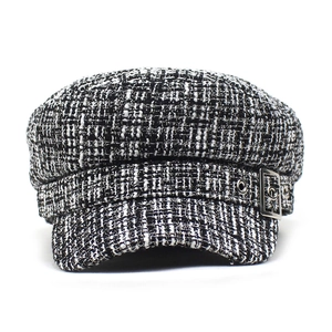 Casquette gavroche classique en tweed noir et blanc avec boucle argentée femme