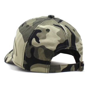 Detail view of camouflage baseball cap showing adjustable antique brass metal buckle