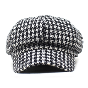 Classic black and white houndstooth newsboy cap in warm wool blend for women