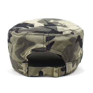 Detail of adjustable metal buckle on military camouflage flat top baseball cap