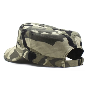 Detail of jungle camouflage military cap with adjustable metal buckle and canvas texture