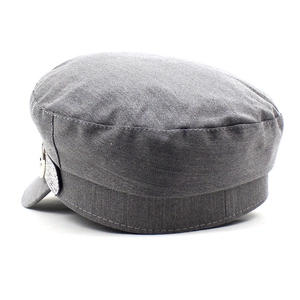 Detailed view of dark grey navy hat featuring durable twill cotton and silver metal button