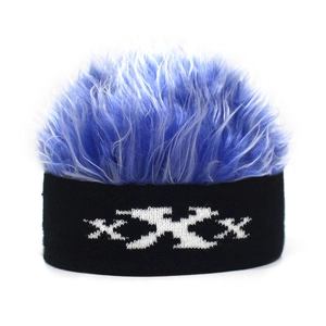 Detail of blue spike wig hat with black knitted headband featuring white XXX embroidery