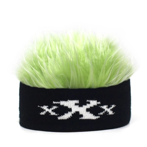 Detail of creative green wig beanie with black headband and white XXX knit embroidery