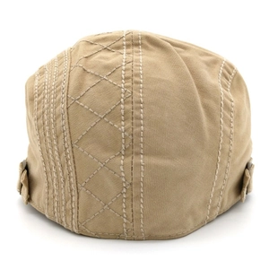 Khaki cotton newsboy cap with white contrast stitching and adjustable metal buckles