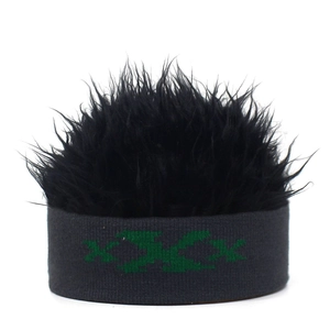 Detail of funny knit wig hat featuring black faux hair and green XXX lettering