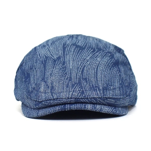 Detailed close-up showing the blue jacquard denim texture and striped pattern of this flat cap