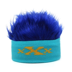 Detail of creative blue wig beanie with yellow embroidered pattern on the knit band