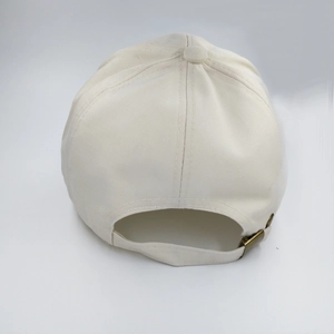Unisex cream cotton baseball cap with adjustable bronze metal buckle and long brim