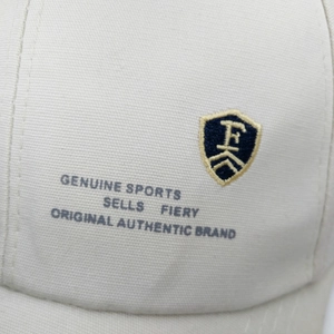 White baseball cap with high-density shield embroidery and premium cotton twill texture