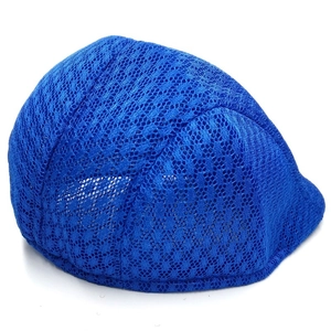 Detail showing the intricate floral lace mesh texture on a bright blue summer sun hat