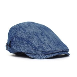 Detail of blue denim ivy cap featuring vintage washed texture and metal side buckle
