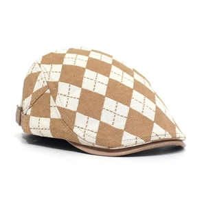Detail of diamond pattern beret with side metal buckle and fine stitching craftsmanship