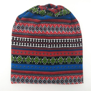 Detail view of ethnic geometric pattern on knitted warm beanie hat for outdoors
