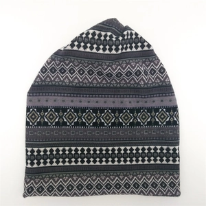 Detail of winter knit beanie showing Nordic geometric patterns and soft texture