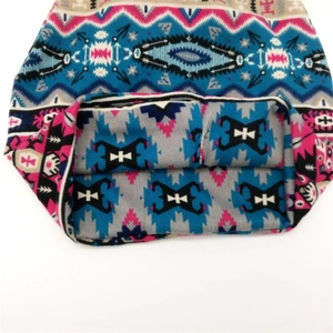 Geometric boho knit beanie scarf set with pink and blue vibrant patterned weaving