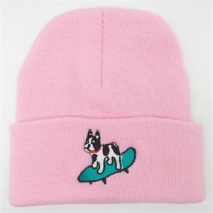 Pink rib-knit beanie for women featuring a dog on a skateboard embroidery design