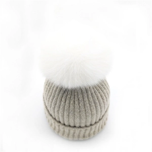 Classic light grey knit beanie with white fur pom pom for women winter warmth