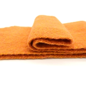 Thick orange knit wool scarf for parents and children with warm textured winter pattern