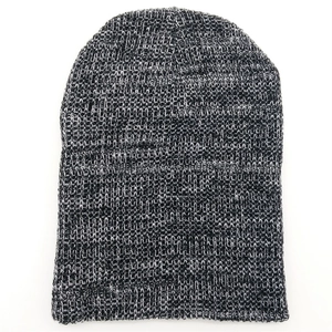 Close-up of black and white marl knit beanie showing fine soft yarn texture details