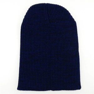 Detailed close-up of dark blue ribbed knit beanie showing texture and thick winter fabric