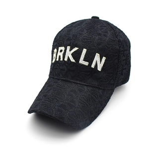 Women's black lace baseball cap with white BRKLN 3D embroidery and curved brim