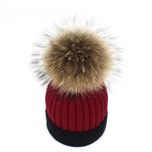 Two-tone cashmere knit beanie with large raccoon fur pompom for women winter warmth