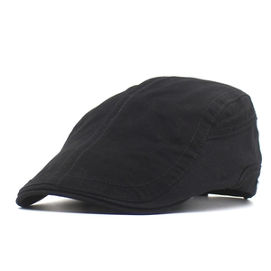 Classic black cotton newsboy cap for men with a flat brim and reinforced stitching details
