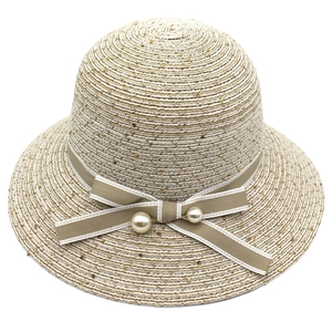 Elegant beige straw sun hat with sparkling sequins, ribbon bow and pearl accents for women